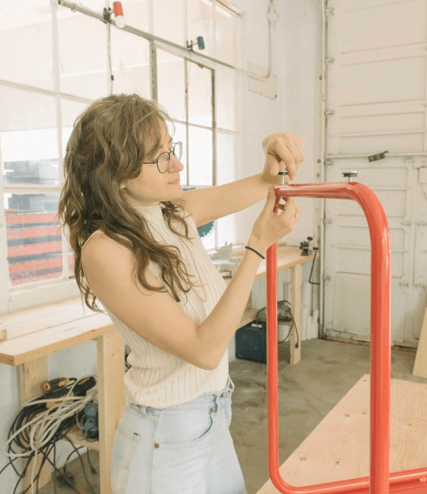 Woman assembling equipment